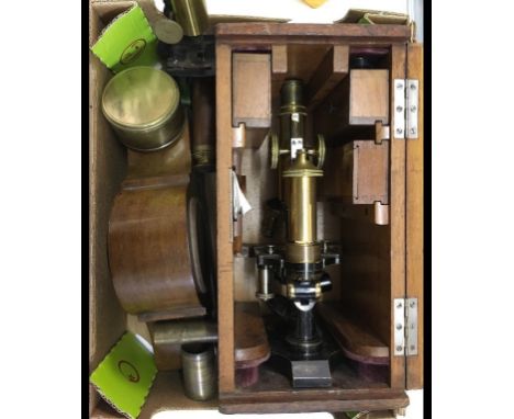 An E Leitz Wetzlar lacquered brass monocular microscope, No 85018, boxed, a student's microscope, a three draw telescope, a m