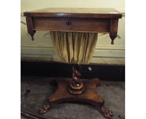 A Victorian rosewood games table, with inlaid chess board top, barley twist column and quatraform base with paw feet, 45 cm w