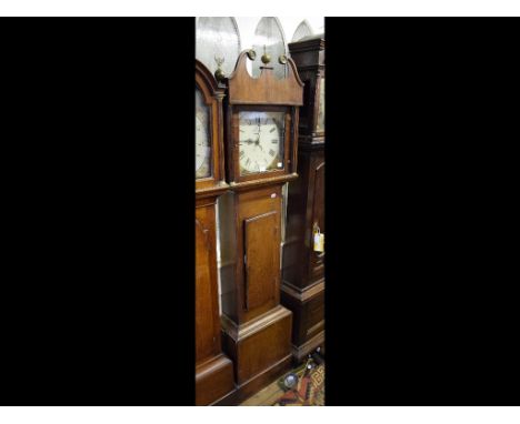 A longcase clock, the 30.5 cm square painted dial with Roman numerals and calendar dial, signed W Priddy Langport, fitted a 3