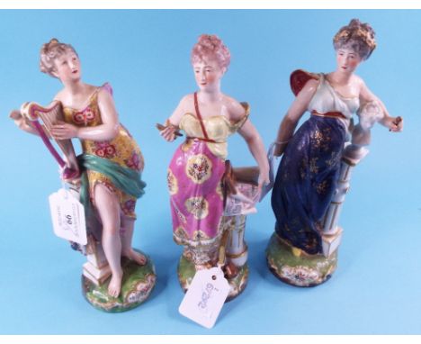 A Crown Derby figure, of a lady playing a harp, 21 cm high, and two others similar (a.f.) (3)