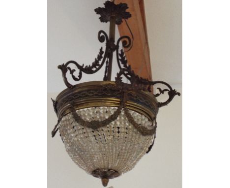 A French style brass mounted bag type chandelier, with swag and foliage decoration, 70 cm high    Condition report Report by 