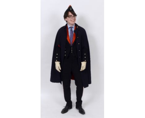 A Royal Artillery officer's mess uniform, with cap, gloves and cloak