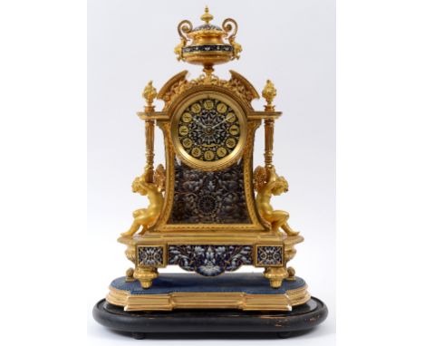 A late 19th century French mantel clock, the 9.5 cm diameter dial with Roman numerals, fitted an eight day movement, stamped 