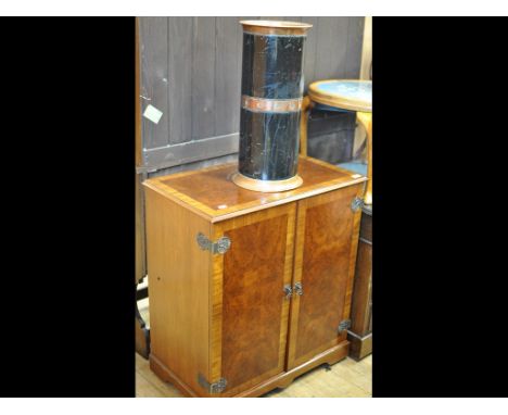 A George III style kneehole desk, 120 cm wide, a walnut floor standing corner cupboard, two tables, a stick stand, and a cabi