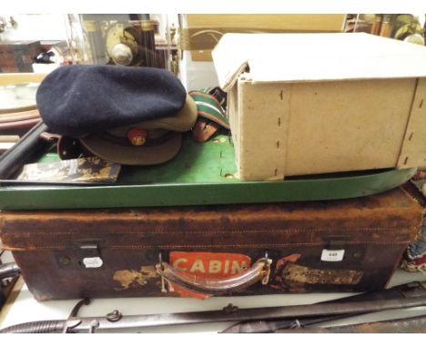 A Royal Berkshire Regiment beret, cap, cap badges and associated items, a bagatelle board and a leather suitcase (qty)