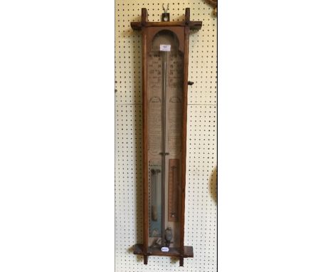 An Admiral Fitzroy's barometer, in an oak case, 104 cm high
