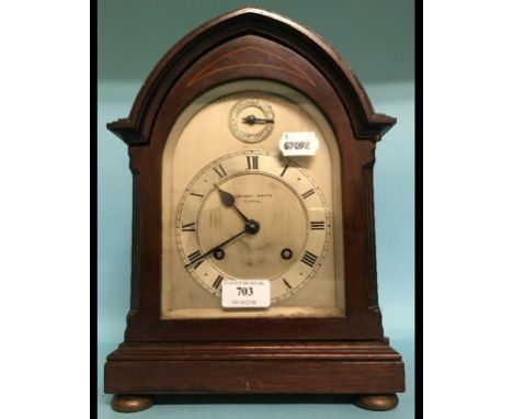 A mantel clock, the silvered dial with Roman numerals and Fast/Slow dial, signed Clement White Yeovil, fitted an eight day mo