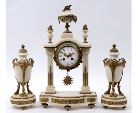 A clock garniture, the clock having a 9 cm diameter enamel dial with Arabic numerals, fitted an eight day movement, in a marb