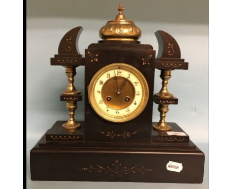 A black slate mantel clock, with gilt metal mounts, 35 cm high