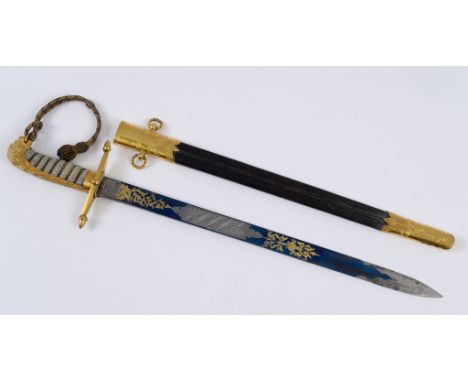 A Victorian Naval Midshipman's dirk, the Chief Captain's Prize HMS Britannia July 1876, with a Hawkes blued steel blade, wire