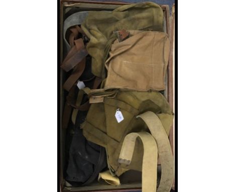A military rucksack, and other items, in a travelling trunk (qty) Condition report Report

There is no gas mask in the lot.  