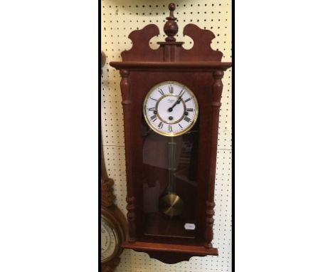A carriage timepiece, the white dial with Roman numerals, signed Rapport London, in a four pillar case, 15.5 cm high, another