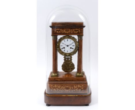 A French portico clock, the white enamel dial with Roman numerals, fitted a movement striking on a bell, in an inlaid rosewoo