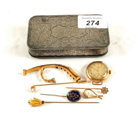 A Victorian Silver plated snuff box containing a 9ct Gold watch strap and other items