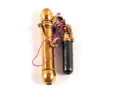 A 9ct Gold propelling pencil in suspension holder and one other