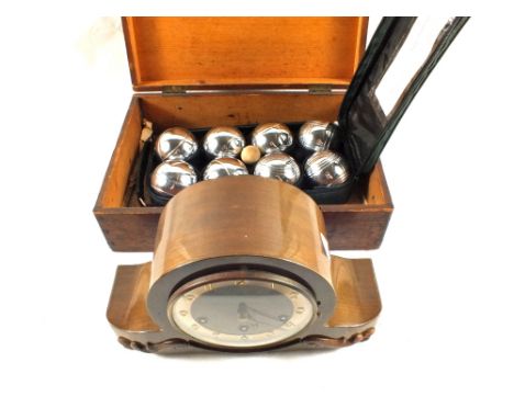 A Pine box containing a set of boulles and a Walnut striking mantel clock
