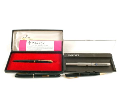 Two Parker fountain pens and a Watermans pen and pencil