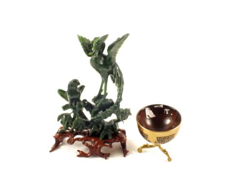 A carved Jade bird group and a Brass clad coconut cup