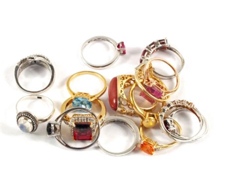 Fourteen various Silver rings and one metal ring set with Moonstone, Topaz, Tourmaline, Opal and other stones