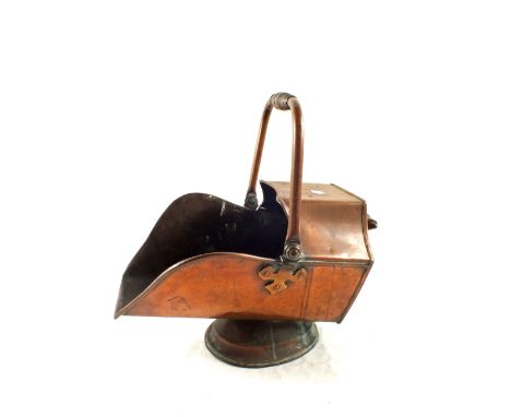 A Brass fender and Copper coal helmet