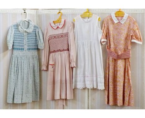 Hand smocked dresses, ages 5 and 6, made by Daisy Chain of Norfolk in the late 1970's, Liberty print and other fabrics, one p