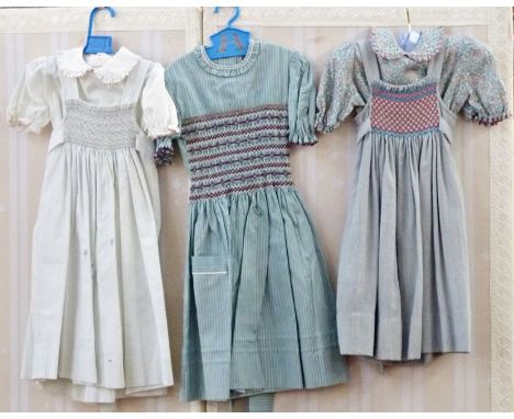 Various hand smocked children's dresses and pinafores, made in the late 1970's by Daisy Chain ( Daisy Chain as featured in Vo