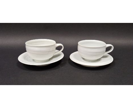 Joanna Howells (b.1960) a pair of studio porcelain cups and saucers with celadon glaze, impressed JH mark to base, cup height