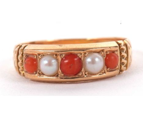 A Victorian 15ct coral and split pearl ring, set with alternating coral cabochons and split pearls within a rectangular chann