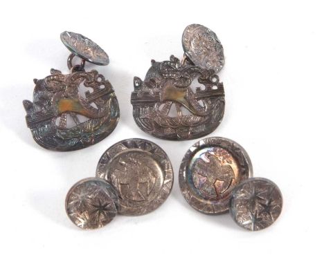 Two pairs of silver cufflinks by Malcolm Appleby: the first with pierced oval panels depicting a galleon at sea, 2.3mm wide, 