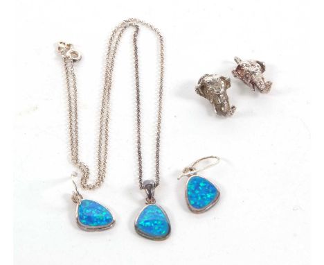 An opal necklace and earrings, comprised of an aysmetric opal, collet mounted with closed back stamped 925, together with a m