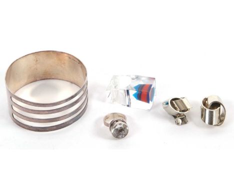 A group of mid 20th century jewellery to include a Finnish silver bangle, stamped 916 with Finnish date stamp for 1967, with 