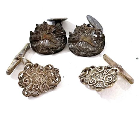 Two pairs of silver cufflinks by Malcolm Appleby: the first depicting an octopus with a central eye, hallmarked Edinburgh 200