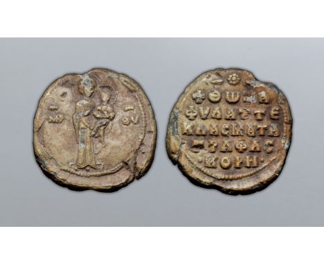 Byzantine Lead Seal. Thomas Klasmatas, 11th century AD. The Virgin Mary, nimbate, standing facing, holding Christ on her left