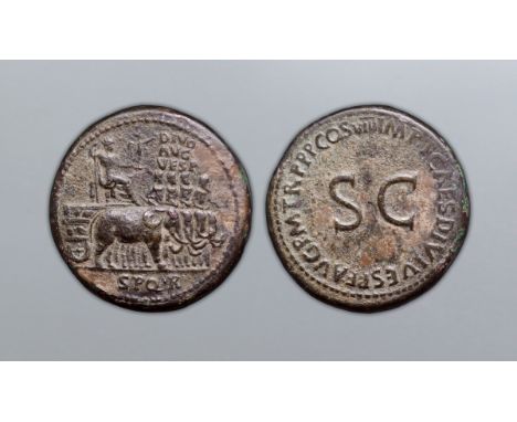 Divus Vespasian Æ Sestertius. Rome AD 80-81. Struck under Titus. DIVO AVG VESP, the deified Vespasian seated to right, holdin