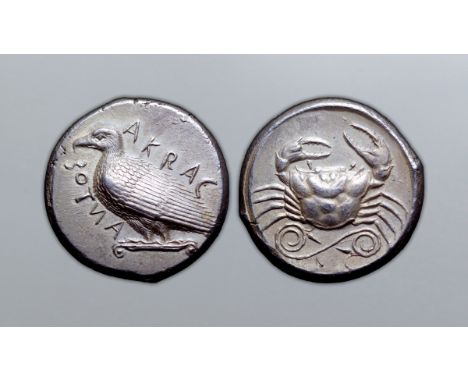 Sicily, Akragas AR Tetradrachm. Circa 460-446 BC. Sea eagle standing left on Ionic capital, AKRACANTO? around / Crab; spirall