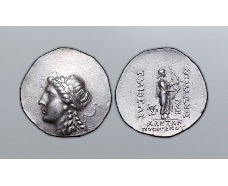 Troas, Alexandreia Troas AR Tetradrachm. Year 148 = 153 BC. Laureate head of Apollo left / Apollo Smintheos (the Mouse God), 