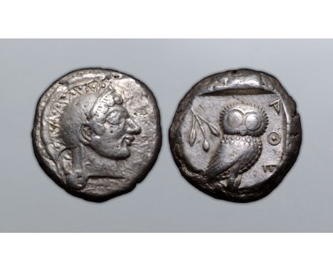 Attica, Athens AR Tetradrachm. Circa 490-482 BC. Archaic head of Athena right wearing crested helmet decorated with chevron a