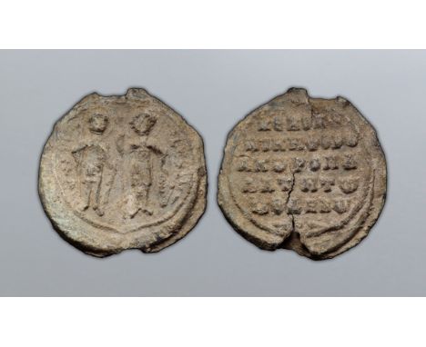 Byzantine Lead Seal. Nicephorus, Protokouropalates, 11th century AD. St. Demetrios, on left, holding lance and parazonium, an