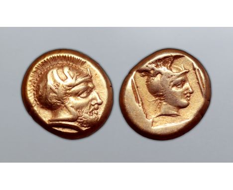 Lesbos, Mytilene EL Hekte. Circa 412-378 BC. Head of Ares right, wearing crested helmet decorated with forepart of griffin / 