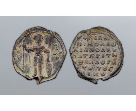 Byzantine Lead Seal. Nikolaos, Protospatharios, Hypatos and Krites, 11-12th century AD. St. Theodoros with spear and shield, 