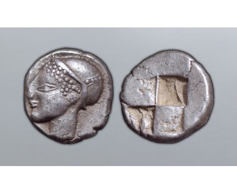 Ionia, Phokaia AR Diobol. Circa 500-480 BC. Female head left, wearing helmet or close fitting cap / Rough incuse square. SNG 