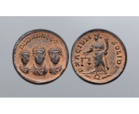 Theodosius I, with Arcadius and Honorius, Æ Exagium Solidi Weight. Constantinople, AD 402-408. DDD NNN GGG, diademed and drap
