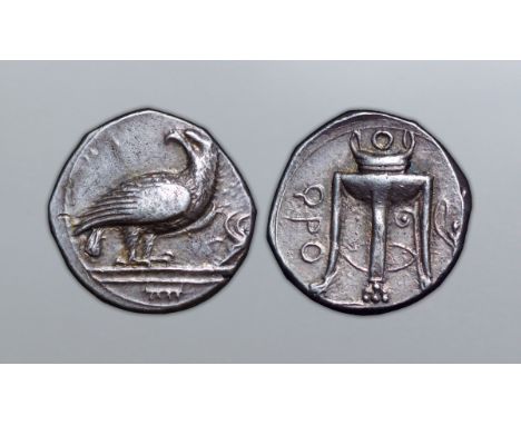 Bruttium, Kroton AR Stater. Circa 380-350 BC. Eagle standing to right, head reverted; animal skull to right / Tripod altar ad