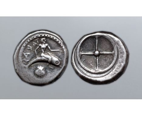 Calabria, Tarentum AR Didrachm. Circa 480-470 BC. Taras seated on dolphin to right, shell below, TAPA? (retrograde) behind / 