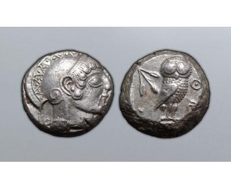 Attica, Athens AR Tetradrachm. Circa 490-482 BC. Archaic head of Athena right wearing crested helmet decorated with chevron a