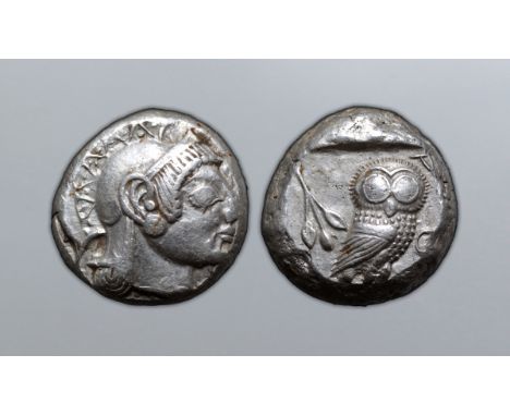 Attica, Athens AR Tetradrachm. Circa 490-482 BC. Archaic head of Athena right wearing crested helmet decorated with chevron a