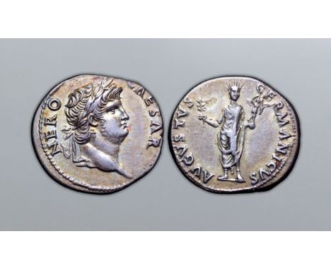 Nero AR Denarius. Rome, AD 64-65. NERO CAESAR, laureate head right / AVGVSTVS GERMANICVS, Nero, radiate and togate, standing 