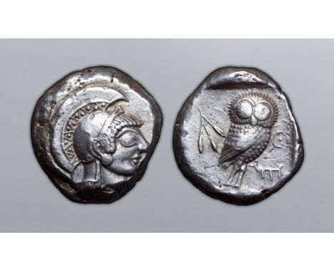 Attica, Athens AR Tetradrachm. Circa 490-482 BC. Archaic head of Athena right wearing crested helmet decorated with chevron a