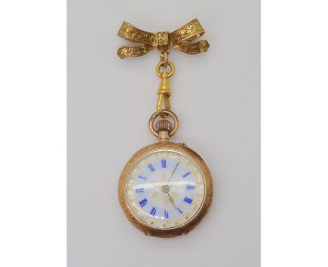A 14K GOLD OPEN FACE FOB WATCH with a decorative French gold transfer patterned dial &amp; blue Roman numerals. with a decora