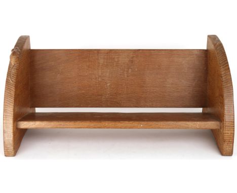 A ROBERT "MOUSEMAN" THOMPSON OAK BOOK TROUGH&nbsp; with curved adzed end supports carved with signature mouse, 21cm high x 46
